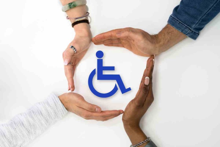 Simbolo disabilità e mani in cerchio
